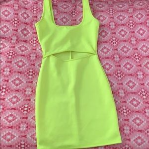 Neon green body cone dress.